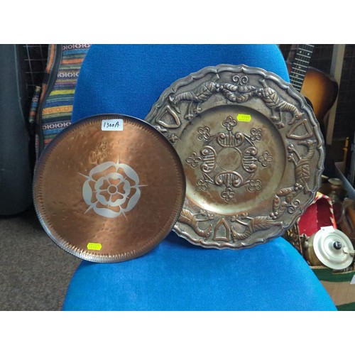 1300A - Two metal platters inc. one copper with Tudor rose detail, largest dia.36cm