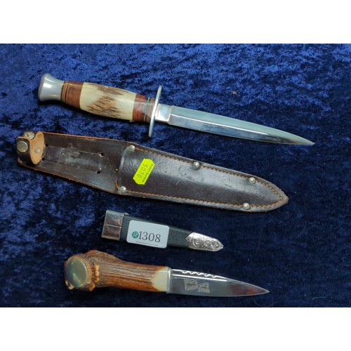 1308 - Two horn handled knives, one William Rogers 'I Cut my Way' and one J.Howell & son 'Skean-Dhu'