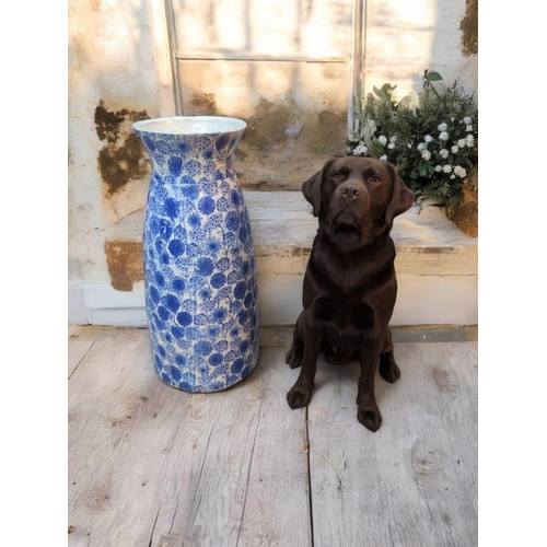 560 - Impressive very large blue & white glazed terracotta vase, with floral decoration. H80cm