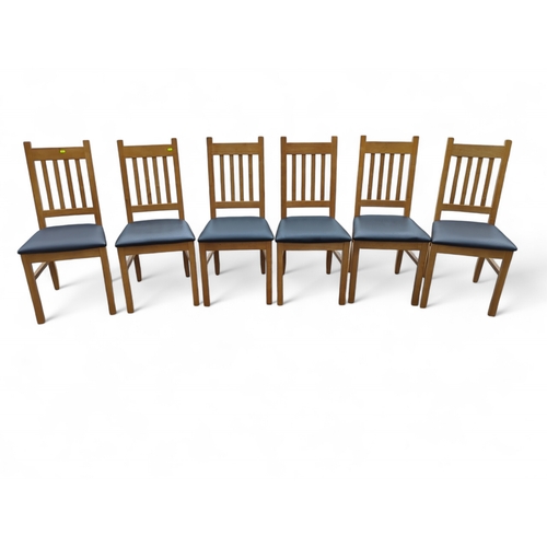 554 - Set of 6 modern leather seated dining chairs