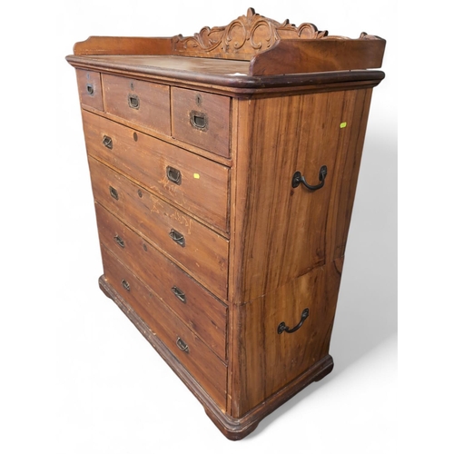 534 - Late C19 Camphor wood 2-part campaign chest of drawers, with top carved back, 7 variously sized draw... 