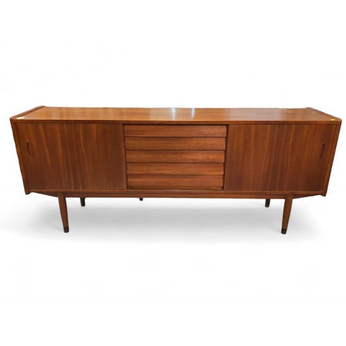 516 - Nils Jonsson for Hugo Troeds, Sweden, teak sideboard. With 5 central drawers inc. cutlery drawer, an... 