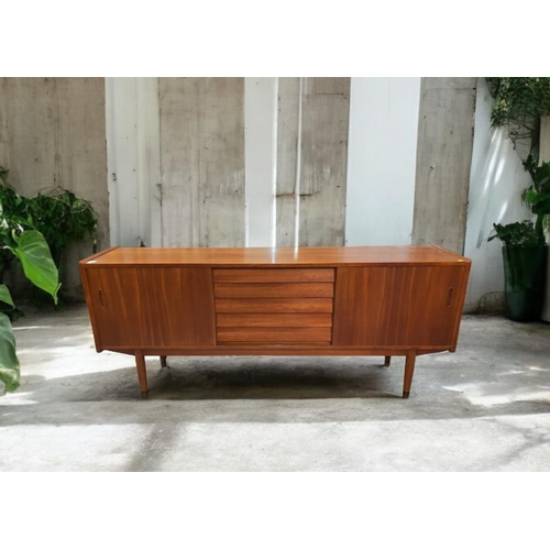 516 - Nils Jonsson for Hugo Troeds, Sweden, teak sideboard. With 5 central drawers inc. cutlery drawer, an... 