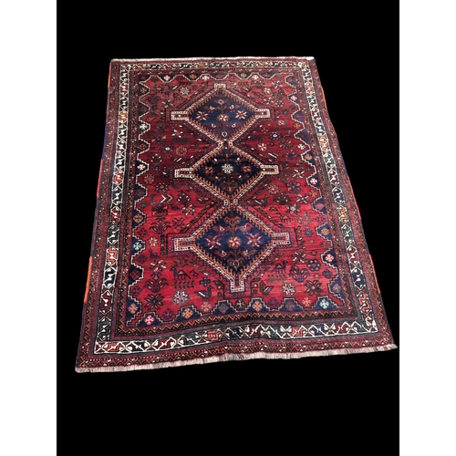 507 - Hand knotted Shiraz rug. W177cm L252cm