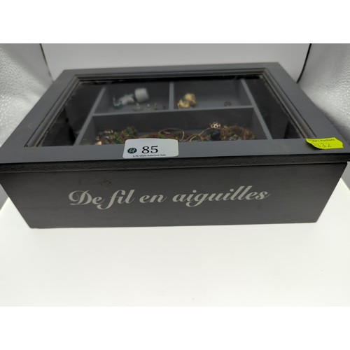 85 - Grey box part filled with costume jewellery Inc Harrypotter earrings, hair clips, bracelets Etc.