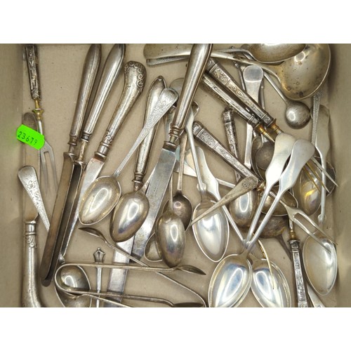 93 - Quantity of flatware, including 305 grams of British hallmarked solid silver, hallmarked silver hand... 