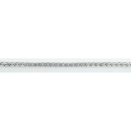 27 - 18ct white gold and diamond line bracelet, comprising an articulated line of 47 claw-set brilliant-c... 