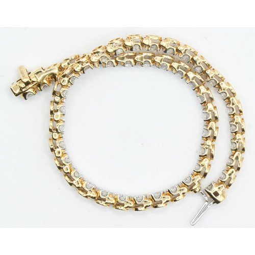 28 - 18ct gold and diamond line bracelet, comprising an articulated line of 46 claw-set brilliant-cut dia... 