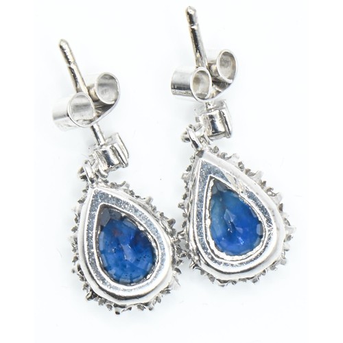 32 - Pair of 18ct white gold, sapphire and diamond pendant earrings, length 18mm, gross weight 3.78 grams