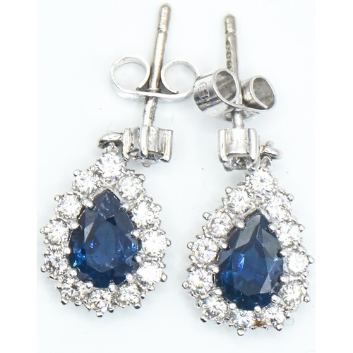 32 - Pair of 18ct white gold, sapphire and diamond pendant earrings, length 18mm, gross weight 3.78 grams