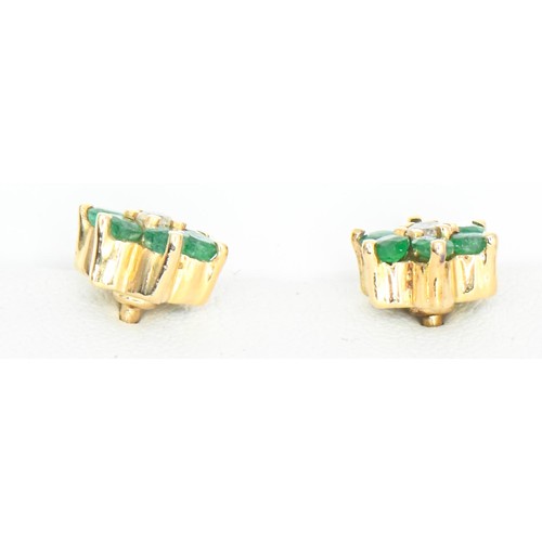 43 - Pair of 18ct gold, emerald and diamond flowerhead ear studs, diameter 8mm, gross weight 3.25 grams