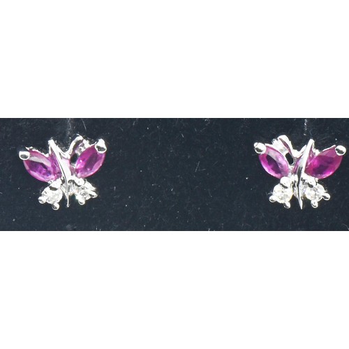 45 - Pair of 18ct white gold, ruby and diamond 'butterfly' ear studs, width 7mm, gross weight 1.55 grams