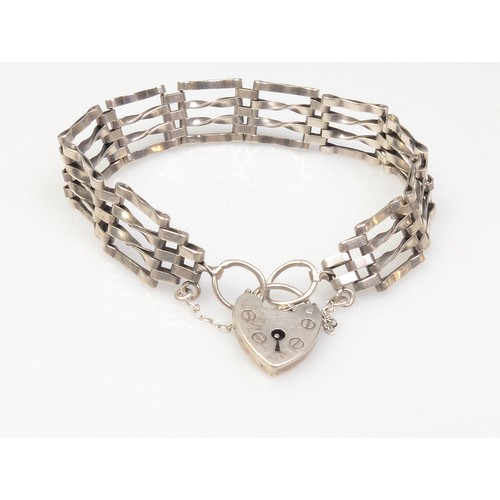 63 - Silver gate link bracelet with heart-shaped padlock clasp, together with silver and white metal earr... 