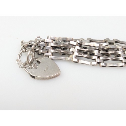 63 - Silver gate link bracelet with heart-shaped padlock clasp, together with silver and white metal earr... 