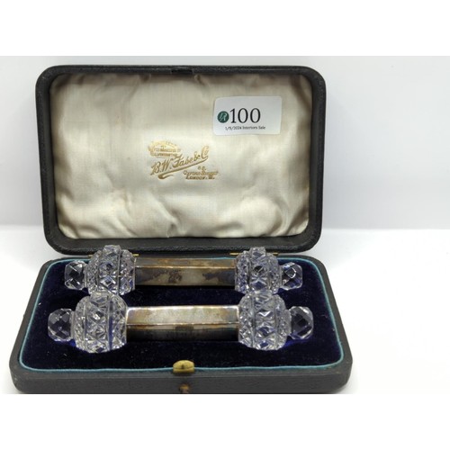 100 - Cased pair of silver and cut glass knife rests, Birmingham 1909