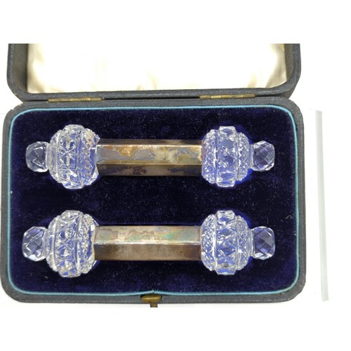 100 - Cased pair of silver and cut glass knife rests, Birmingham 1909