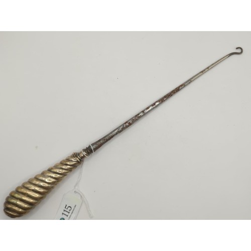 115 - Silver handled button hook, length 35 cms