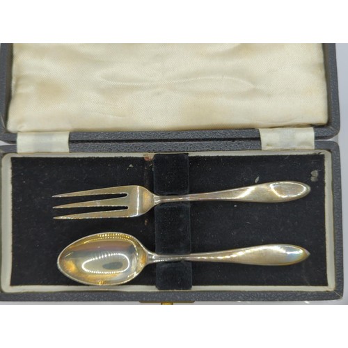 119 - Silver dog-nosed spoon, boxed silver fork & spoon set together with plated sugar nips & af p... 