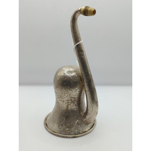 121 - White metal ear horn, retailed by rein & Sons, The Strand, London, total height 19cms 