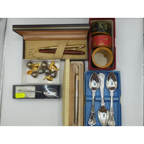 128 - Selection of items and collectables Inc Parker fountain pen, sheaffer gold plated roller ball + napk... 