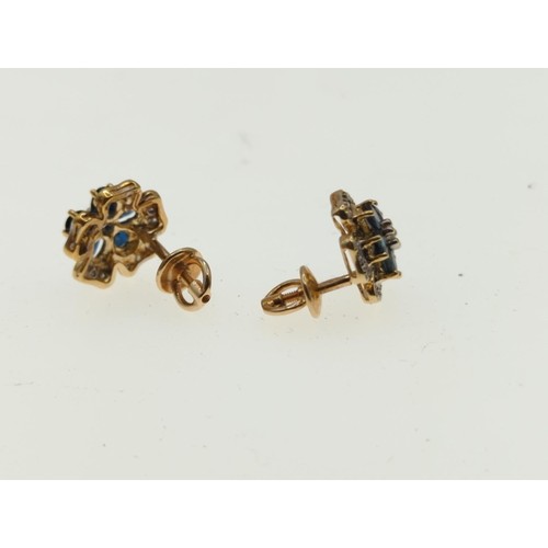 21 - 14ct gold, sapphire and diamond flowerhead earrings, diameter 13mm, gross weight 4.05 grams