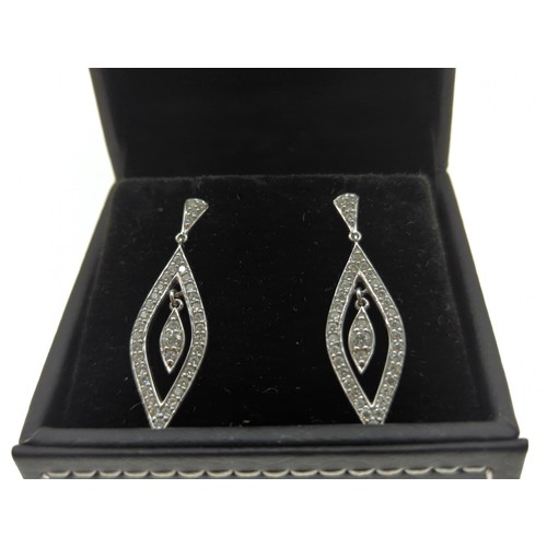 22 - Pair of 18ct white gold and diamond pendant earrings, length 34mm, gross weight 5.5 grams