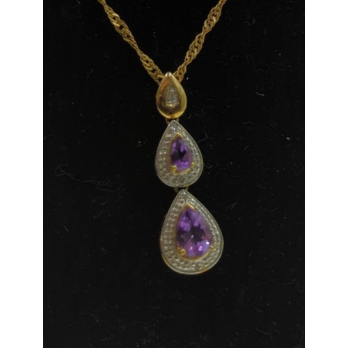 30 - 9ct gold, amethyst and diamond pendant with 9ct gold twist chain, pendant and chain stamped 375, len... 