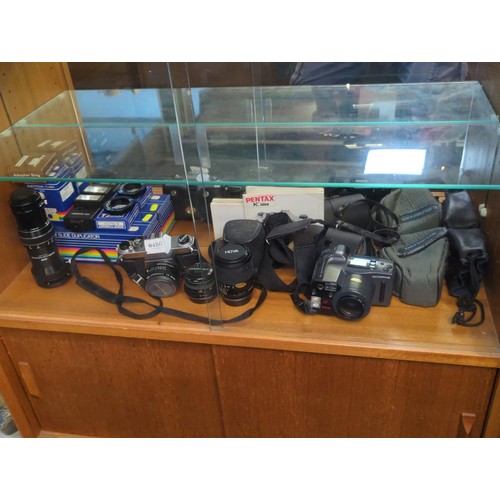 486 - Pentax K1000 camera body with 2 extra lenses & accessories plus a Zoom slide duplicator & an... 