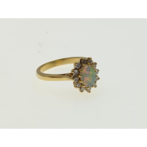 44 - 18ct gold, opal and diamond cluster ring, size L1/2, gross weight 4.1 grams