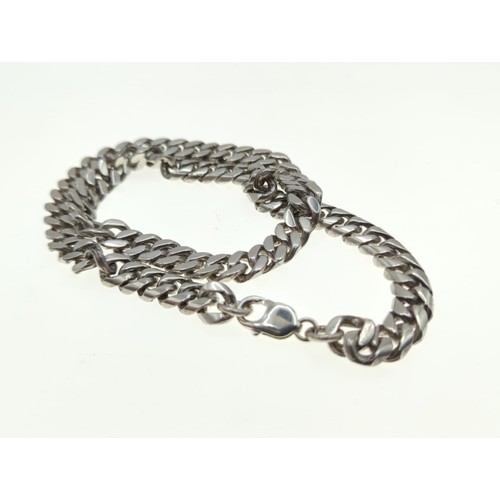 61 - Silver flat curb linkchain, length 55 cms, wt 147 gms