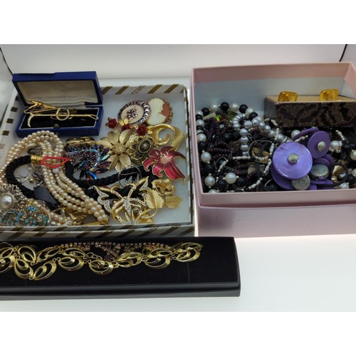 84 - 2 x boxes of costume jewellery Inc bracelets, necklaces, cufflinks, tie pins Etc. 