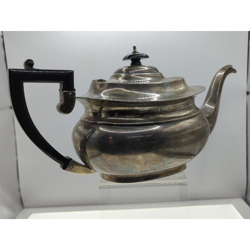 97 - 3 piece silver tea service with ebonised handles & knobs hallmarked Birmingham water jug & s... 