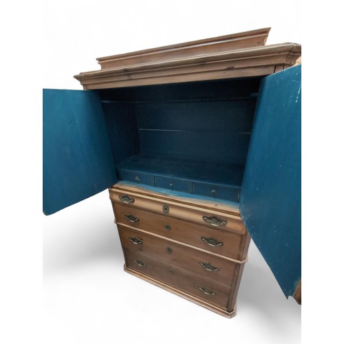 571 - Pine housekeepers cabinet / press. With 2 upper serpentine shaped doors, covering blue painted inter... 