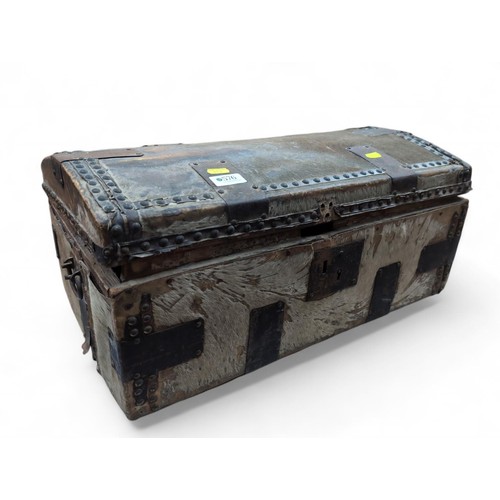 576 - A leather Hide-covered, metal wrapped small travel trunk. W57cm D30cm H27cm