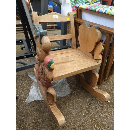 106 - Child's hardwood teddybear carved rocking chair, damage to one teddy's arm