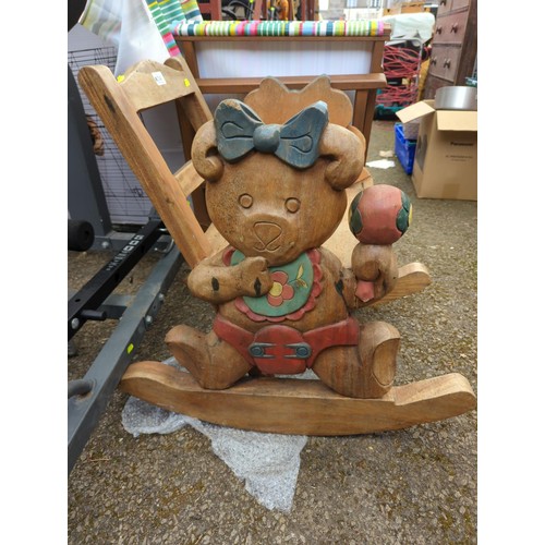 106 - Child's hardwood teddybear carved rocking chair, damage to one teddy's arm