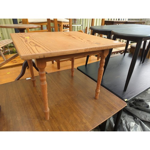 110 - Small pine occasional table, raised on slim turned supports. W55cm D55cm H43cm.