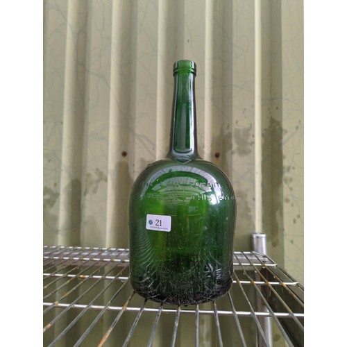 21 - Large green Courvoisier cognac bottle. H39cm.