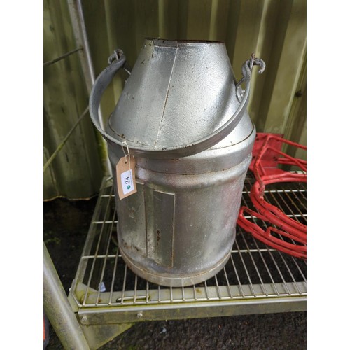 24 - 5 gallon milk churn/planter. H48cm.