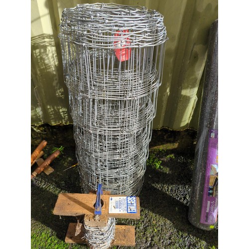 27 - Roll of stock fencing and small amount of barbed wire. Unknown lengths.