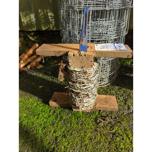 27 - Roll of stock fencing and small amount of barbed wire. Unknown lengths.