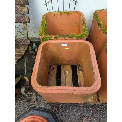 65 - 2 terracotta pipe sections/planters.