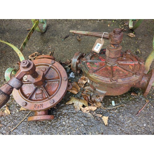 69 - 2 vintage cast iron hand water pumps.