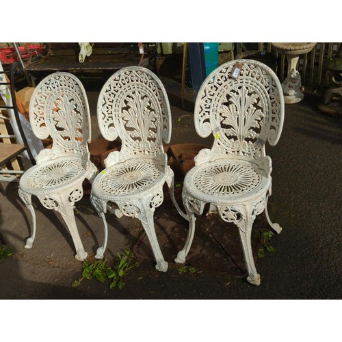 85 - 3 metal bistro chairs.