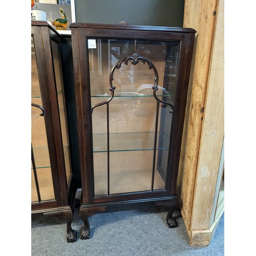 737 - 2 shelf glass display cabinet with ball and claw feet. W58cm D32cm H127cm.