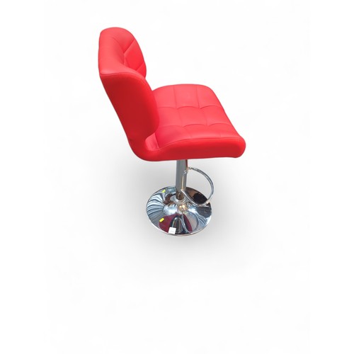 740 - Red cushioned bar stool. Height adjustable. W49cm D47cm H114cm fully extended.