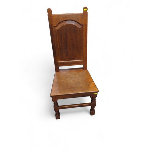 754 - Oak hall chair. W49cm D42cm H111cm.