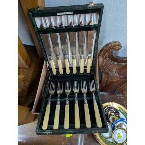 677 - Box of assorted silver plated flatware etc.