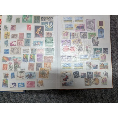 683 - Box of partly filled stamp albums, eighteen in total