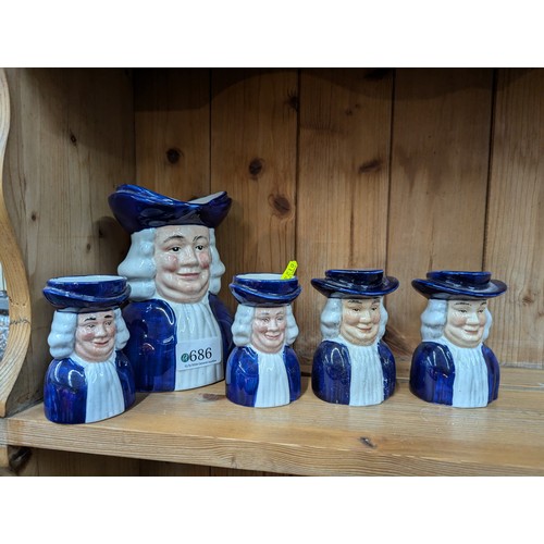 686 - Wood & sons character jug, two small mugs & salt and pepper